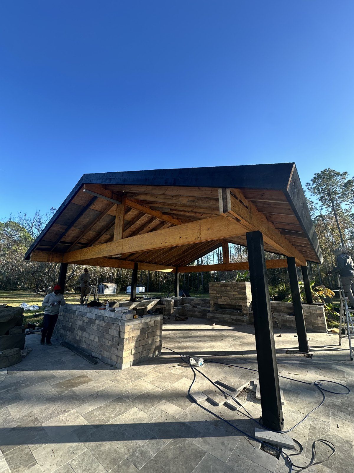 Pavilion Build · Black Metal Columns